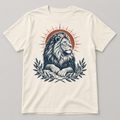 Concept preview: cream Lion of Judah T-shirt with navy lion, rust sun and olive branches. Final garment pending.